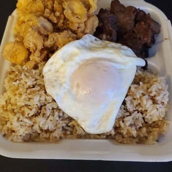 Trining's Bakery & Cafe - Surf & turf-silog!  Fried calamari, tapa (sweet marinated beef) & garlic rice to-go.  I've made the over easy egg at home. - Bakeries Near Me - San Diego, California