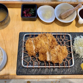 Saku - Chicken thigh katsu was amazing! Comes with unlimited rice, miso soup, and cabbage salad; as well as some great condiments to dip into. - Japanese Near Me - Vancouver, British Columbia Saku - Chicken thigh katsu was amazing! Comes with unlimited rice, miso soup, and cabbage salad; as well as some great condiments to dip into. - Japanese Near Me - Vancouver, British Columbia