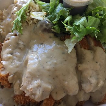 Max & Lucy's - Chicken Cutlet w/ brown rice, toss, and mushroom gravy. Just under $10 - New American Near Me - Honolulu, Hawaii Max & Lucy's - Chicken Cutlet w/ brown rice, toss, and mushroom gravy. Just under $10 - New American Near Me - Honolulu, Hawaii