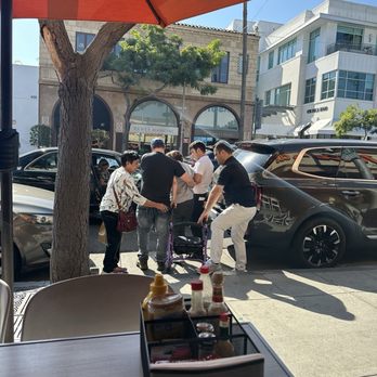 Nate'n Al's - Here, waiter, Daniel helps a restaurant guest that was not his customer get into her car. This place is fantastic. - Delis Near Me - Beverly Hills, California