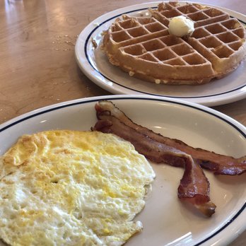 IHOP - Belgian Waffle Combo with eggs over hard and two pieces of bacon - Breakfast & Brunch Near Me - Pflugerville, Texas IHOP - Belgian Waffle Combo with eggs over hard and two pieces of bacon - Breakfast & Brunch Near Me - Pflugerville, Texas