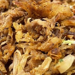 Muchas Gracias Mexican Food - Dried out, chopped up, jerky-like carnitas.