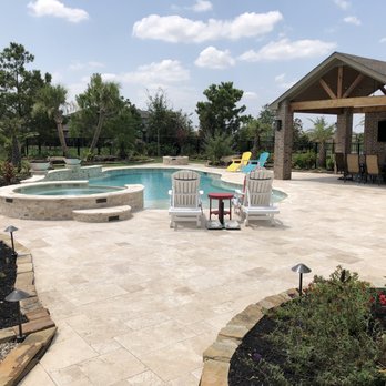 Triton Pools - Full backyard transformation in Bridgeland.  Included pool, patio, freestanding patio cover, outdoor kitchen and full landscape. - General Contractors Near Me - Cypress, Texas