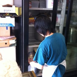 Asian Prepared Foods - Scooping fresh soy bean milk from pot
