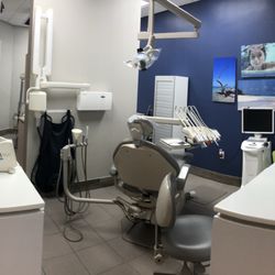 Smiles By Design: John Garcia - Exam Room #3 Featuring photos taken by Dr. Garcia on Caribbean family vacations. This room has our CEREC computer used for taking 3D scans!