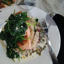 The Grilled Salmon on top of delicious mashed potatoes topped with Spinach dish was good! The Grilled Salmon on top of delicious mashed potatoes topped with Spinach dish was good!