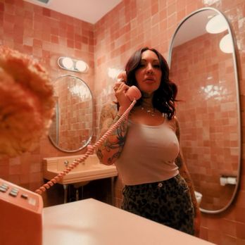 Gus' Sip & Dip - Bathroom with a phone - Pubs Near Me - Chicago, Illinois Gus' Sip & Dip - Bathroom with a phone - Pubs Near Me - Chicago, Illinois