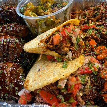 Texican BBQ - a variety of food items - Food Trucks Near Me - Olmito Texas, Texas