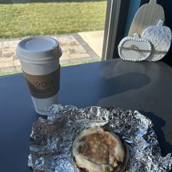 Nour - My latte with an extra shot of espresso, white mocha, and lavender. And a sausage egg and cheese breakfast sandwich on an English muffin