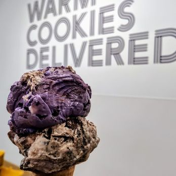 Insomnia Cookies - a hand holding a cone of ice cream - Bakeries Near Me - Los Angeles, California Insomnia Cookies - a hand holding a cone of ice cream - Bakeries Near Me - Los Angeles, California