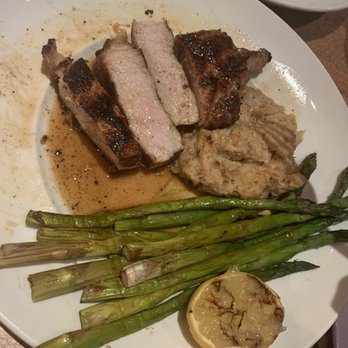 Seasons 52 - Pork Chop, cauliflower, and asparagus - New American Near Me - Oak Brook, Illinois Seasons 52 - Pork Chop, cauliflower, and asparagus - New American Near Me - Oak Brook, Illinois