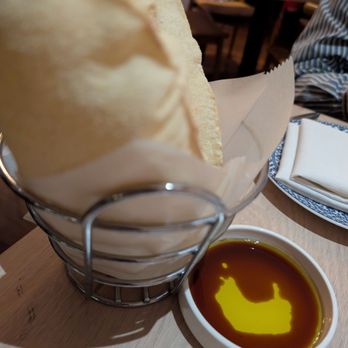 Zaytinya - Bread is very puffy. I'd prefer plain olive oil without vinegar - Greek Near Me - Washington, DC, District of Columbia