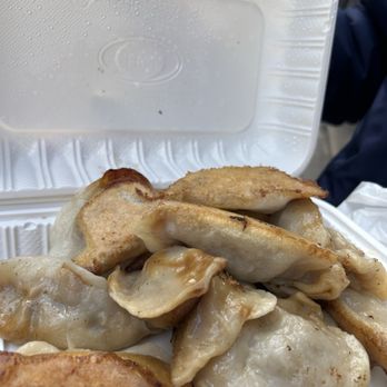 Jin Mei Dumpling - The container of pipping hot dumplings. - Chinese Near Me - New York, New York Jin Mei Dumpling - The container of pipping hot dumplings. - Chinese Near Me - New York, New York