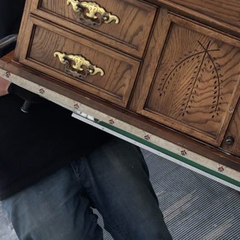 Smart Move - Upside down cedar chest on dolly. No straps or blankets to protect it or our walls. - Movers Near Me Smart Move - Upside down cedar chest on dolly. No straps or blankets to protect it or our walls. - Movers Near Me