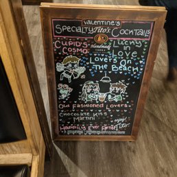 a chalk board with a menu on it