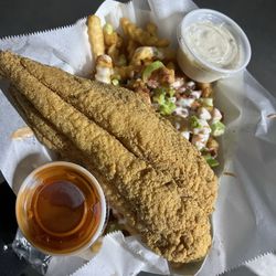 Happy Cajun - Catfish and ratchet fries