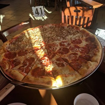 Pazzo! Big Slice Pizza - Giant 24 inch half pepperoni half sausage - Italian Near Me - Hoover, Alabama Pazzo! Big Slice Pizza - Giant 24 inch half pepperoni half sausage - Italian Near Me - Hoover, Alabama