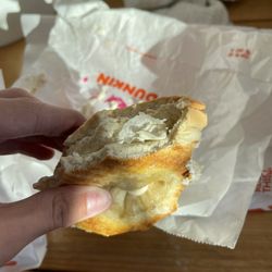 Dunkin' - there is parchment paper in my cream cheese.