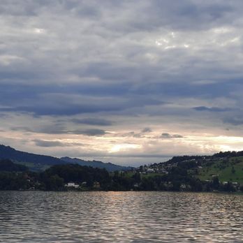 Schiffahrtsgesellschaft des Vierwaldstättersees - Sun trying to peak - Boat Tours Near Me - Lucerne, LU