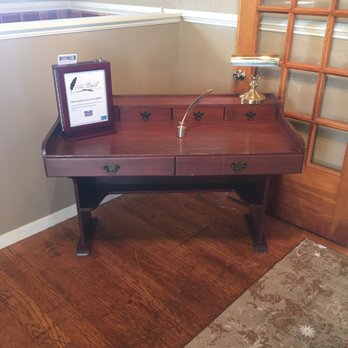 The Quill - a desk with a picture frame on it - Coffee & Tea Near Me - Blacksburg, Virginia The Quill - a desk with a picture frame on it - Coffee & Tea Near Me - Blacksburg, Virginia