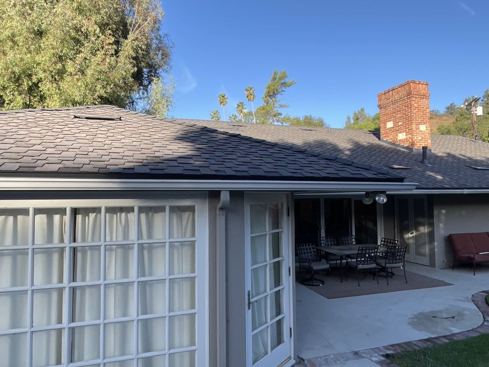 Slide of Mike's Roofing & Building