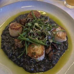 Scallops with squid ink risotto Scallops with squid ink risotto