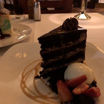 801 Chophouse - The Chocolate Cake, not super sweet, key lime cheesecake in background, which I preferred - Steakhouses Near Me - Clayton, Missouri