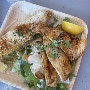 Spearfish Grille - Caesar salad with fresh fish and corn - Seafood Near Me - Sarasota, Florida Spearfish Grille - Caesar salad with fresh fish and corn - Seafood Near Me - Sarasota, Florida