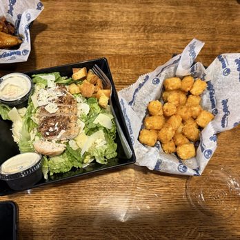 BuffaLouie's - Ceasar salad and side of Tots - Chicken Wings Near Me - Bloomington, Indiana BuffaLouie's - Ceasar salad and side of Tots - Chicken Wings Near Me - Bloomington, Indiana