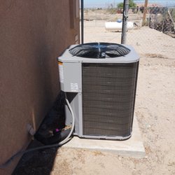 Pistole's Heating And Cooling - Installing new condenser