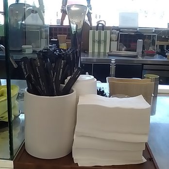 Café Matcha - Napkins and straws, part of their kitchen in the back. - Coffee & Tea Near Me - Los Angeles, California
