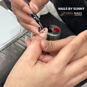 Brea Nails - Sunny's latest masterpiece: a snake in a tree nail design!  Imagine that! Ready to try something wild? - Nail Salons Near Me - Spring Valley, California