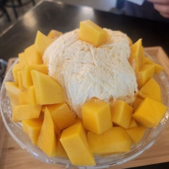Cafe Hesed - They said a dollar for mochi lol. No toppings other than the mango - Cafes Near Me - Little Ferry, New Jersey