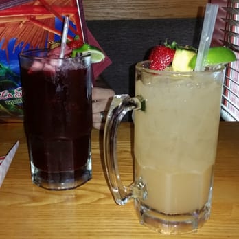 Machu Picchu - Home made sangria. .. and a peach margarita... large and delish. - Mexican Near Me - Charlotte, North Carolina