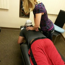 Ferguson Chiropractic & Wellness - Dr. Ferguson performing a thoracic adjustment