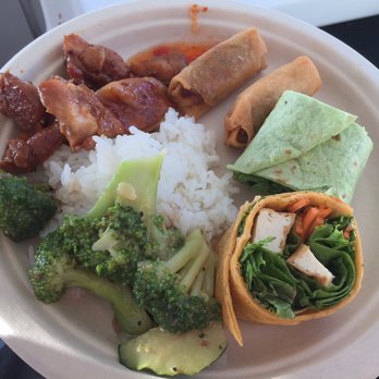 Makani Catamaran - Our meal on Friday Night Fireworks and Sunset Sail: teriyaki chicken, spring rolls, beef broccoli, tofu curry wraps, rice - Boating Near Me - Honolulu, Hawaii