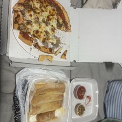 Dozeli Pizzeria - Italian beef pizza and bostco sticks