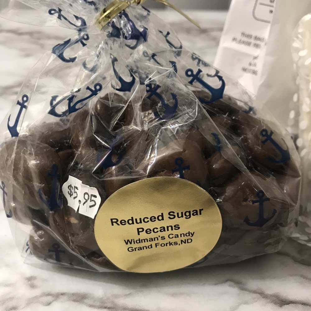 Widman's Candy Shop - Reduced sugar milk chocolate w pecans - Candy Stores Near Me - Grand Forks, North Dakota Widman's Candy Shop - Reduced sugar milk chocolate w pecans - Candy Stores Near Me - Grand Forks, North Dakota