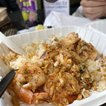 EbiNomi - Best Garlic Shrimp (partially eaten because we couldn't wait). - Asian Fusion Near Me - Honolulu, Hawaii