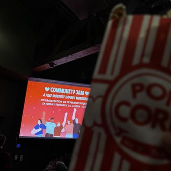 The Improv Centre - a person holding a popcorn bag - Performing Arts Near Me - Vancouver, British Columbia The Improv Centre - a person holding a popcorn bag - Performing Arts Near Me - Vancouver, British Columbia