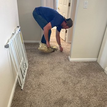 Thermo S Insulation - Here's the roofer cleaning up the insulation they Thermoshield didn't remove. GEEZ - Insulation Installation Near Me - Mesa , Arizona