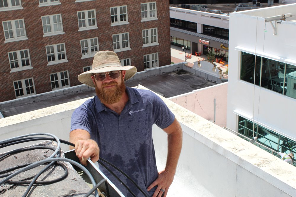 Slide of Northmen Roofing