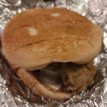 Little Howie's - Pork chop sandwich with tomato and cheese. - American Near Me - Aiken, South Carolina