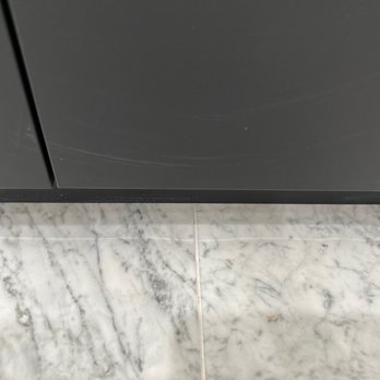 Designer Kitchen & Bath - Cracked tile all the way down and they tried to glue it as if we can't see that - Kitchen & Bath Near Me - Houston, Texas