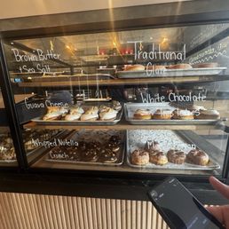 White Chocolate Tres Leches Whipped Nutella Crunch Traditional Glazed Brown Butter & Salt Maple & Bacon Guava & Cheese White Chocolate Tres Leches Whipped Nutella Crunch Traditional Glazed Brown Butter & Salt Maple & Bacon Guava & Cheese