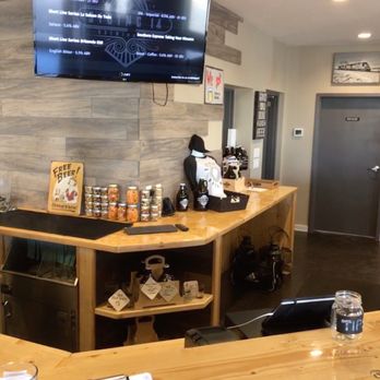 Siding 14 Brewing - Front counter and TV - Breweries Near Me - Ponoka, Alberta Siding 14 Brewing - Front counter and TV - Breweries Near Me - Ponoka, Alberta