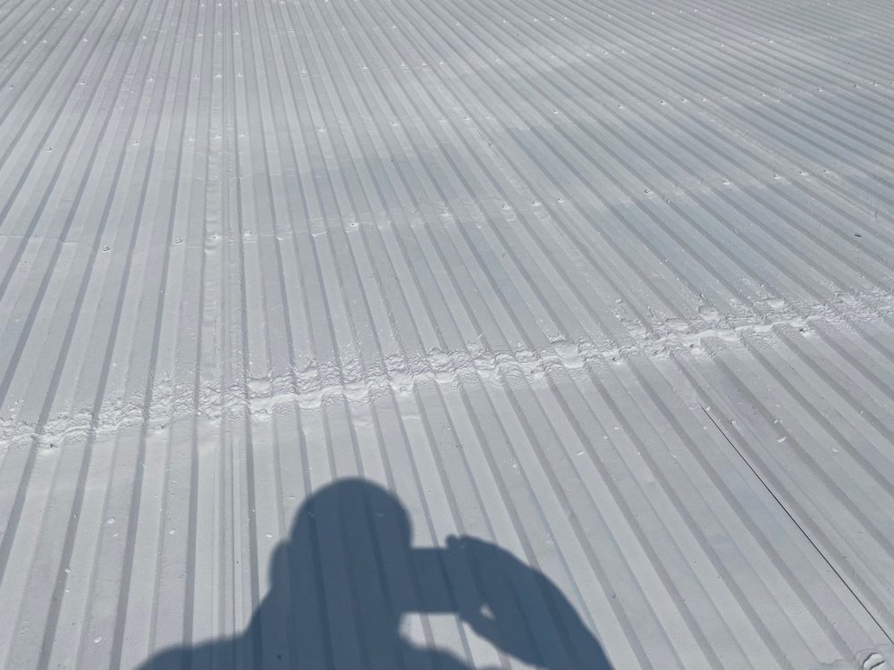 Slide of Rock Solid Roofing & Coatings