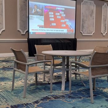 Rosen Plaza - Room set up in a beautiful ballroom to watch Hurricane Ian news. - Hotels Near Me - Orlando, Florida