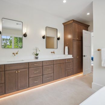New Urban Homes - Custom bathroom vanity, wall-mounted faucets, and tote-kick lighting. - General Contractors Near Me New Urban Homes - Custom bathroom vanity, wall-mounted faucets, and tote-kick lighting. - General Contractors Near Me