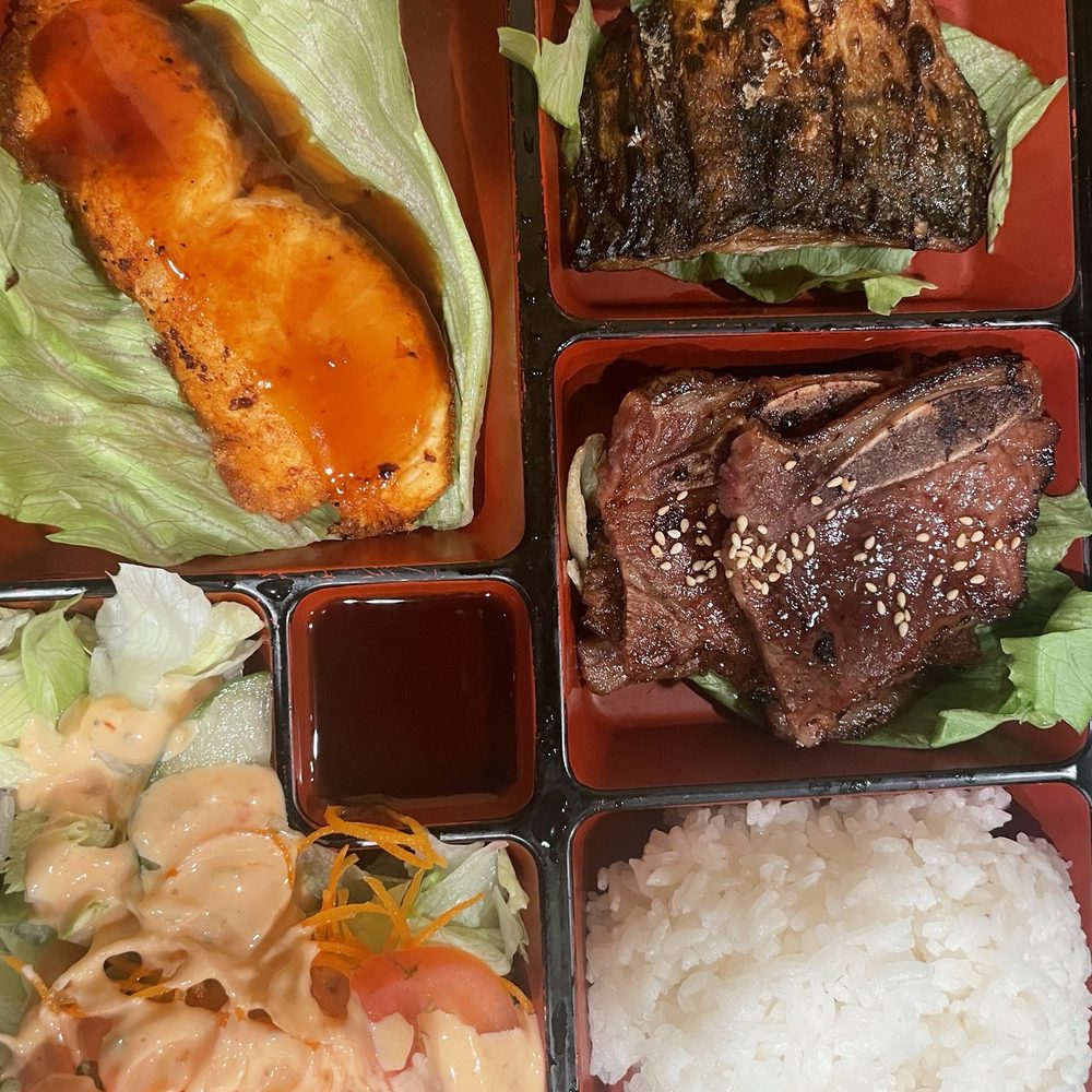 Bashamichi Sushi and Bar - Mackerel, teriyaki salmon, pork ribs. 3 Items Bento Box - Japanese Near Me - Millbrae, California Bashamichi Sushi and Bar - Mackerel, teriyaki salmon, pork ribs. 3 Items Bento Box - Japanese Near Me - Millbrae, California